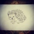 Tired grey-ink hedgehog with flowered back tattoo design