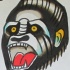 Traditional colorful gnarling gorilla head tattoo design