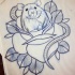 Traditional outline mouse looking out of huge rose bud tattoo design