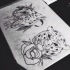 Traditional uncolored cheetah heads with flowers tattoo design