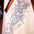 Uncolored fluffy-tentacled jellyfish tattoo design