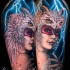 New school style colored shoulder tattoo of tribal woman with owl skull