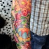 vivaci colori fiori giapponese tatuaggio su braccio
