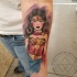 Watercolor wonder woman tattoo forearm