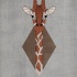 White-and-brown giraffe with geometric head on rhombus background tattoo design