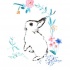 White hare baby in colored floral frame tattoo design