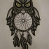 Yellow-eyed grey owl with dream catcher body tattoo design