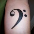 Tatuaggio il disegno nero in stile Yin-Yang