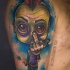 Tatuaggio zombie punk sulla spalla