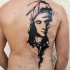 Abstract style black ink half back tattoo of woman face with lettering