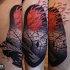 Abstract style colored burning dark forest tattoo on thigh with crow