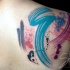 Abstract style colored shoulder tattoo of different lines