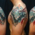Abstract style colored shoulder tattoo of creepy ornaments