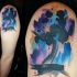 Abstract style colored shoulder tattoo stylized with night sky