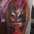 Abstract style colored tattoo of woman face with mask and rose