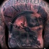 Abstract style colored whole back tattoo of magical wizard with lettering and clock