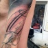 Tatuaje en el brazo, calamar precioso de estilo abstracto