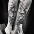Accurato stile fantasy dipinto da Inez Janiak tatuaggio a braccio di donna demoniaca con bug
