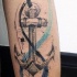 Tatuaje en la pierna,
ancla exelente estilizada