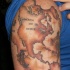 Tatuaje en el hombro, mapa antigua del mundo