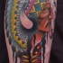 American traditional smoking Indian chief multicolored tattoo on biceps
