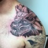 Antike Tigers Statue Tattoo an der Schulter