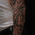 Antic style black ink sleeve tattoo of various detailed statues