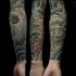 Asian oriental style colored demon sleeve tattoo with chrysanthemum flower in water waves