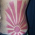 Asian oriental style red sun with long rays red ink tattoo on belly and side