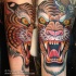 Tatuaje de tigre estupendo que ruge, estilo asiático multicolor
