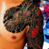 Tatuaje en el hombro,
dragón fantástico asiático