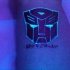 autobot luce nera tatuaggio sulla gamba