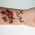 eccezionale ancora con scritto papa` e rose rosse avambraccio tatuaggio