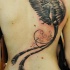 Tatuaggio grande sulla schiena la fenice che vola