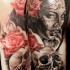 Tatuaje  de mujer muerta y calavera con flor