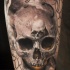 Tatuaje de calavera con cráneo en la frente