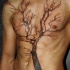 eccezionale albero tatuaggio per uomo