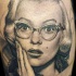 Tatuaje  de hermosa Marilyn Monroe sorprendida
