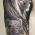Tatuaje en el brazo, dibujo de león y leona