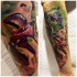 Beautiful looking colored arm tattoo of seductive woman with cherry