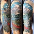 Beautiful looking colored shoulder tattoo of wild life forest with animals and boat