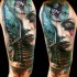 Beautiful looking colored shoulder tattoo of creepy bloody woman with stairs