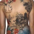 Beautiful looking colored whole back tattoo of Asian old house with tree and slope