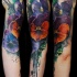 Beautiful painted and colored shoulder tattoo of various flowers