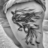 Tatuagem de tinta preta pintada de coxa bonita de pássaro de Fênix por Inez Janiak