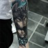 bellissima donna e testa di lupo avambraccio tatuaggio