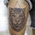 Big black ink engraving style thigh tattoo of tiger with triangle