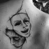 Tatuaje en la espalda, diseño de máscaras triste y feliz