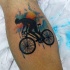 grande colorato antico ciclista tatuaggio su gamba