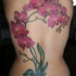 grande orchidee bianche viola tatuaggio sulla schiena
